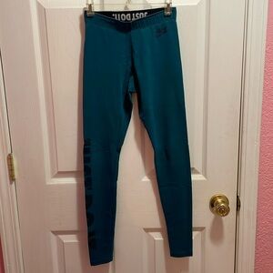 Teal Nike Leggings w/ Writing Down the Side